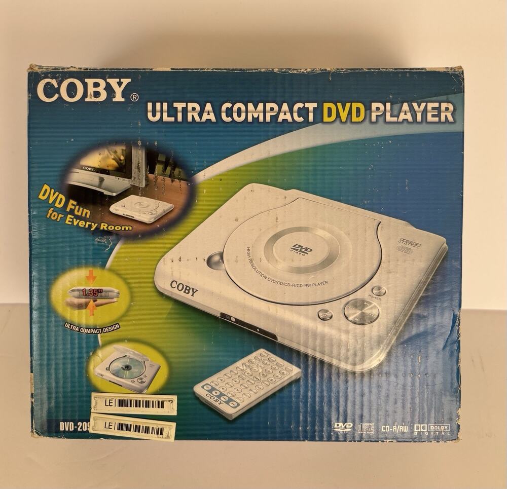 Coby DVD-209 DVD Player Complete With Box-Cords & Remote